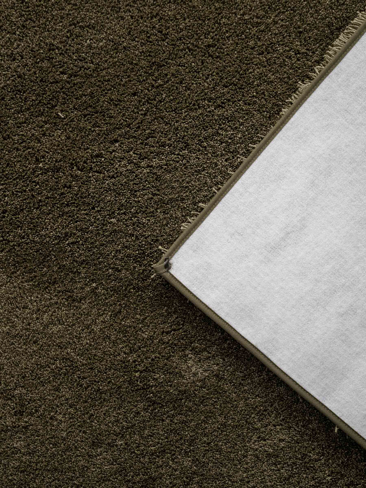Avela soft pile rug in Olive Green – NORUM