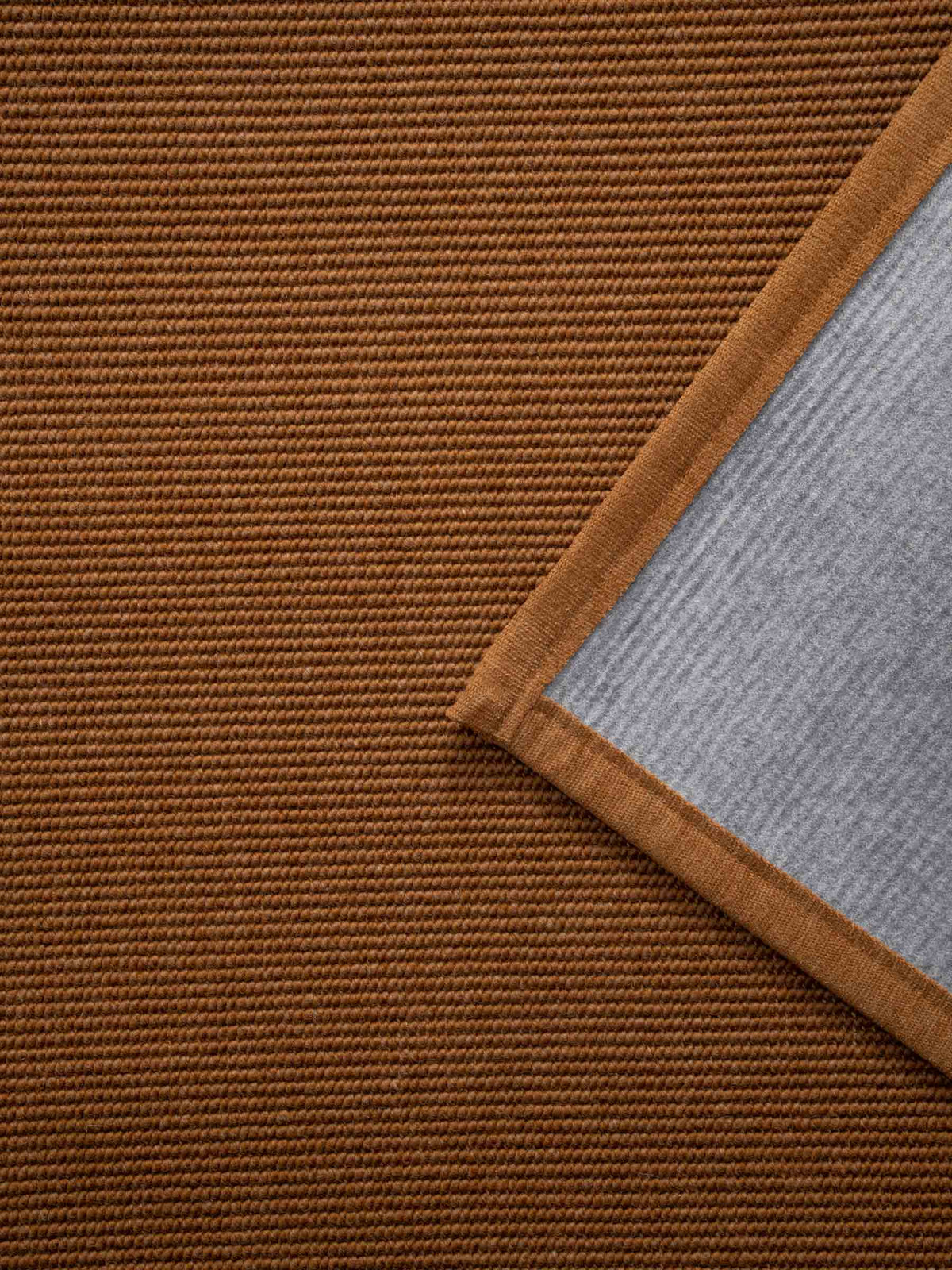 Sarea wool rug in Earth Copper – NORUM