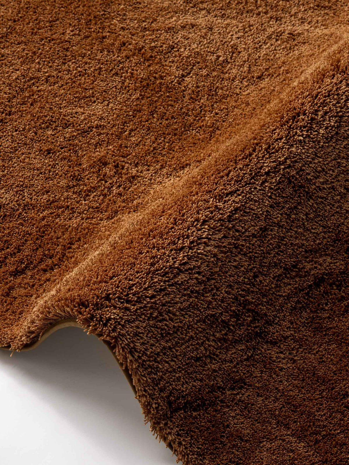 Avela soft pile rug in Clay Copper – NORUM