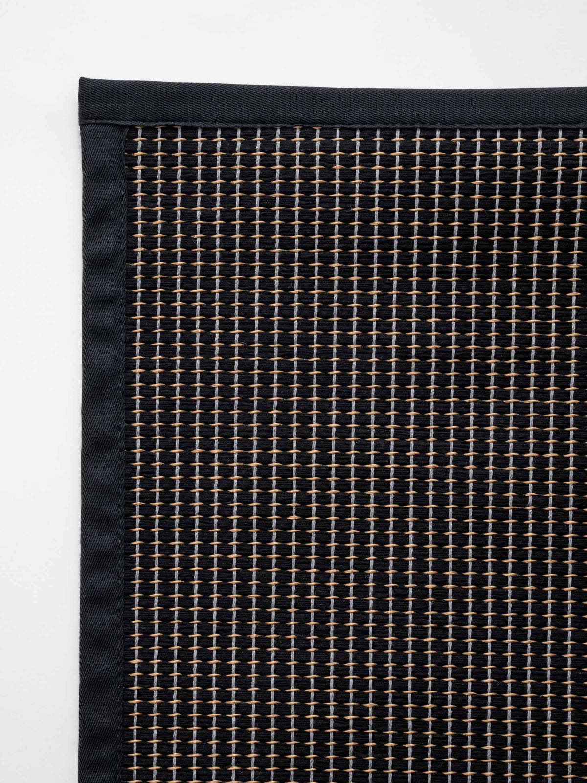 Lyra cotton-paper yarn rug in Soft Black – NORUM