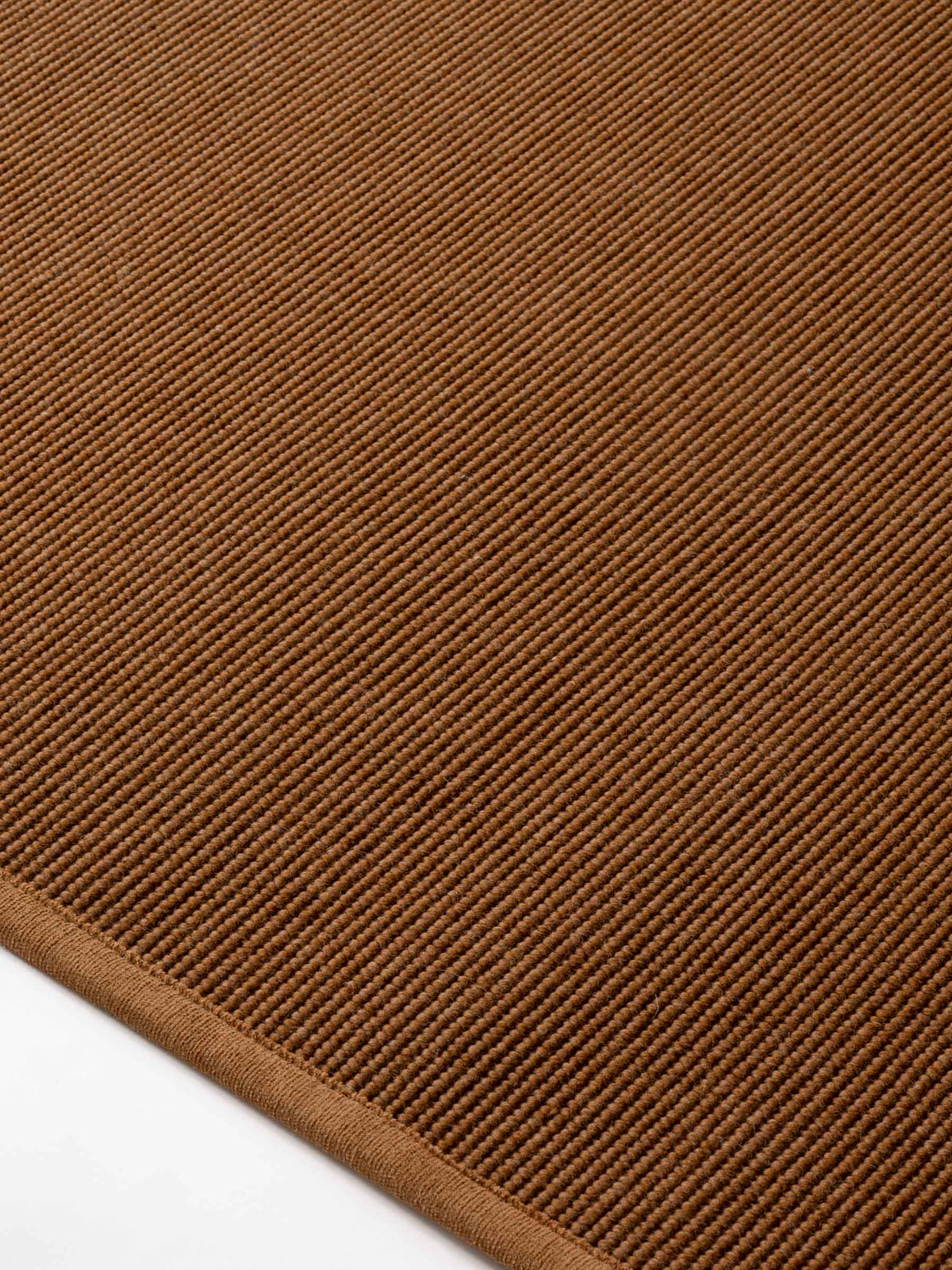 Sarea wool rug in Earth Copper – NORUM