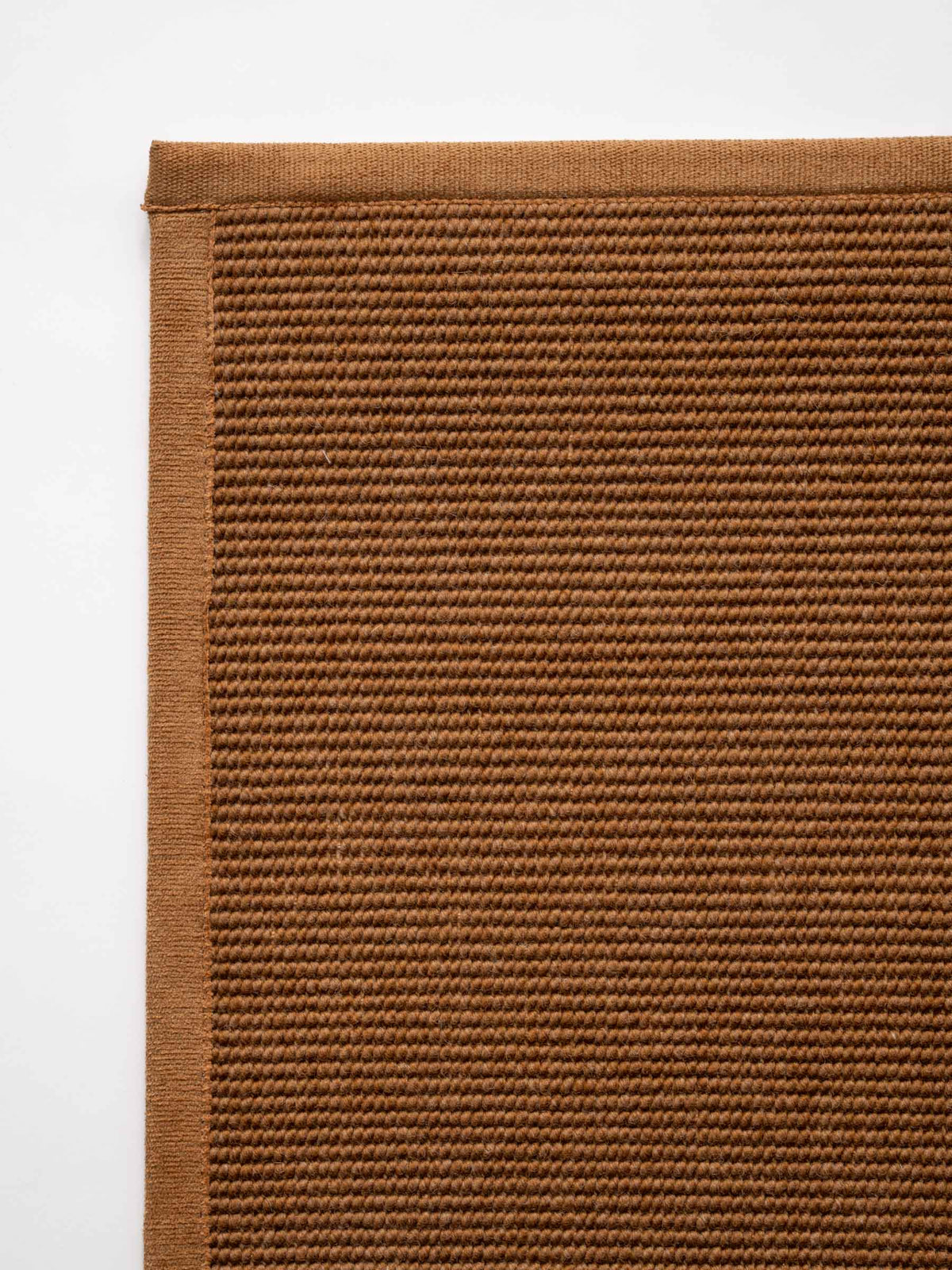 Sarea wool rug in Earth Copper – NORUM